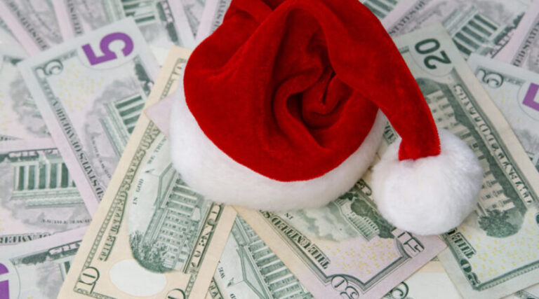 Santa hat on a background of money